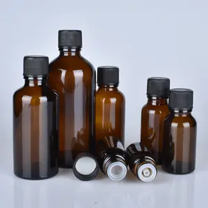 Una botella de aceite esencial de 5-100ml, tapón de gota de cabeza grande a prueba de luz marrón, botella separada de muestra de pequeño volumen