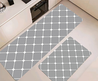Tapis de cuisine moderne tissé noir et blanc à carreaux, avec support antidérapant, surface résistante à l'usure, style ludique pour un intérieur contemporain