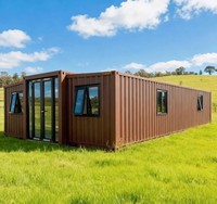 Casa Container Espandibile con Telaio Nero e Layout Interno Personalizzabile, Adatta per Vivere in Singolarità o in Comunità