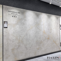 Carreaux de dalle de porcelaine de sol en pierre frittée brillante bon marché 1200X2400mm Grande dalle de pierre artificielle en marbre de luxe de 9mm pour comptoir