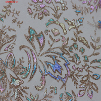 Vente en gros Nouveau tissu de dentelle pailleté populaire avec paillettes brillantes Processus d'estampage à chaud Tissu de dentelle de tulle transparent coloré