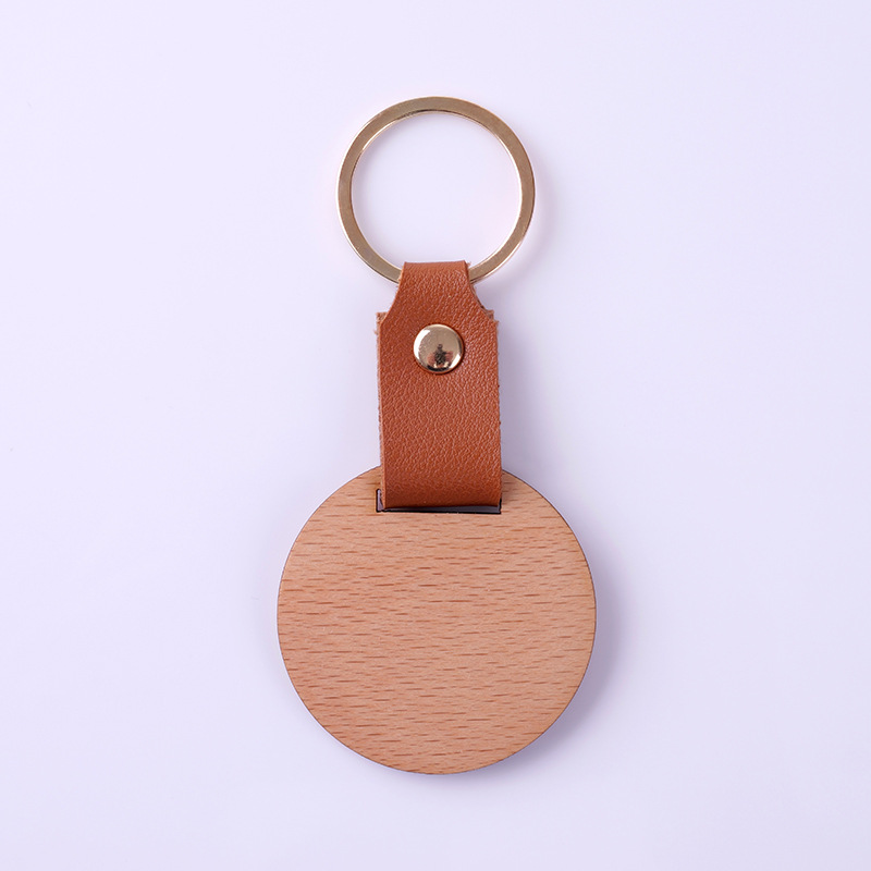 Boucle en placage de bois de hêtre, forme ronde.