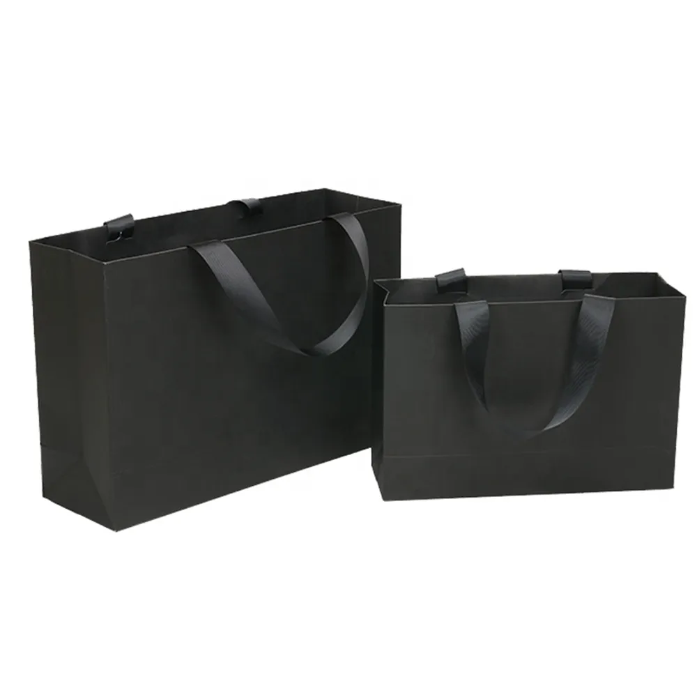 Design élégant Grande Capacité Logo Personnalisé Sac à provisions en papier spécial noir pour vêtement avec rubans