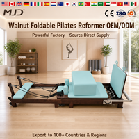 Reformer de Pilates professionnel pliable en bois de noyer avec système de glisse fluide – Équipement de yoga haute performance pour le renforcement du tronc