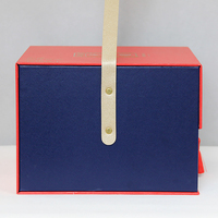 Boîte cadeau en carton magnétique de luxe personnalisée avec feuille d'or poignée de valise rigide matériaux recyclés boîtes en papier avec couvercle magnétique personnalisé
