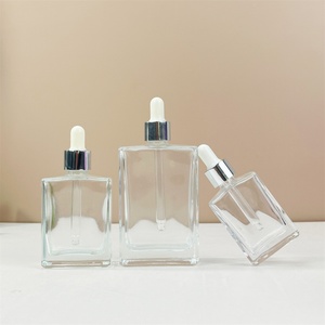 Stock clear 15ml 30ml 50ml 100ml Transparent Flat Shoulder Cylinder Square Glass <b>Dropper</b> <b>Bottle</b> With Silver <b>Dropper</b> Cap - Product Image 2