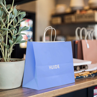 Sacs de shopping en papier kraft recyclables personnalisés avec poignées, vente en gros, sacs cadeaux écologiques colorés avec logo pour boutique de détail
