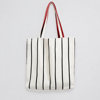 Sac fourre-tout en toile rayée durable et écologique noir et rouge, personnalisable, pliable et multi-usage pour les trajets quotidiens
