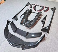 Kit Carrosserie Complet en Fibre de Carbone Sec Style DK de Haute Qualité pour Lamborghini Revuelto : Lame Avant, Jupes Latérales, Diffuseur Arrière, Aileron Arrière et Cache Moteur