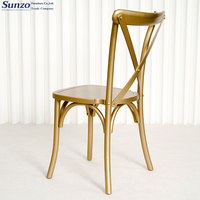 Chaise classique en bois de hêtre à dossier croisé avec finition dorée pour la location de fêtes de luxe et les événements professionnels de banquets hôteliers