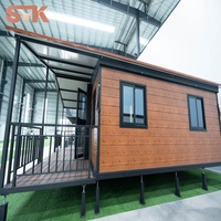 Maison modulaire préfabriquée en conteneur, prix d'usine, personnalisée, 2 chambres, 1 salon avec véranda et auvent, imperméable