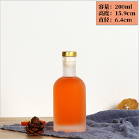 Personnalisé 30ml 40ml 50ml 100ml 200ml clair givré Mini boisson jus café vin whisky Vodka liqueur bouteille en verre avec couvercles