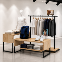 Table de présentation en bois à niveaux avec tringle à vêtements et support de mannequin, pieds en métal noir, fabrication usine