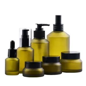 Full set of green cosmetic skincare serum cream oil glass containers lotion bottles and jars with lids skincare empty bottle