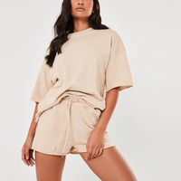 Ensemble de t-shirts et de shorts de jogging surdimensionnés d'été pour femmes Ensemble de salon de survêtement de styles solides respirant et écologique