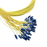 96F LC Uniboot OS2 G657A1 200μm OFNP Breakout Pigtail Polaritas Lurus Kuning