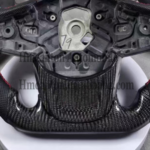 พวงมาลัยรถยนต์ Toyota GR Supra รุ่นใหม่ล่าสุด ผลิตจากคาร์บอนไฟเบอร์และหนังรูพรุน - Product Image 3