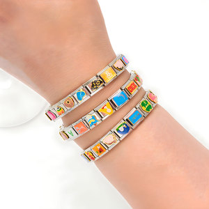 XIXI personalizado <span class=keywords><strong>de</strong></span> acero inoxidable 18K chapado en oro encanto DIY módulo reloj patrón <span class=keywords><strong>de</strong></span> dibujos animados elasticidad joyería <span class=keywords><strong>de</strong></span> moda pulseras <span class=keywords><strong>de</strong></span> cadena - Product Image 6