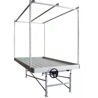 Serre agricole multi-travées HANGDI avec système de culture hydroponique à flux et reflux pour tables de culture verticales intérieures