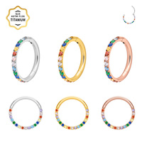 Vente en gros de bijoux de piercing corporel tendance : Anneau de nez clicker et boucle d'oreille en titane ASTM F136 plaqué or 18K avec zircon coloré 16G