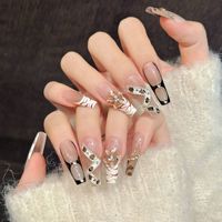 Faux ongles sculptés élégants Leopard Demon pour l'automne et l'hiver