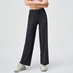 Pantaloni da Yoga Micro Flare da donna a vita alta che solleva la pancia modellando le tasche laterali dei fianchi drappeggiati pantaloni a gamba larga