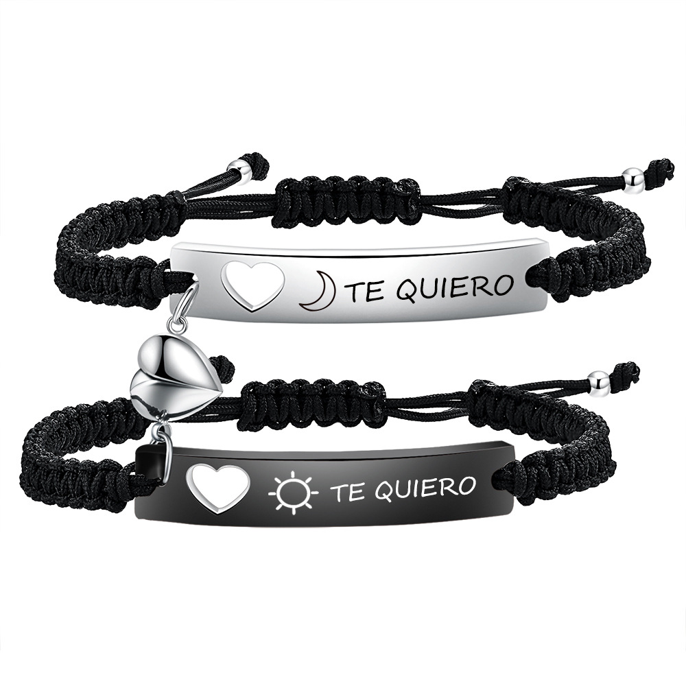 Engraving in Spanish with sun, moon, and heart