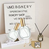 Flacon de parfum vide en verre transparent OEM de haute qualité, 50 ml, avec boîte cadeau et vaporisateur à pompe