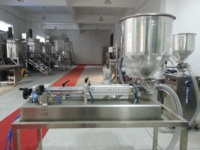 Machine de remplissage pneumatique pour huiles essentielles, cosmétiques, crèmes capillaires, détergents liquides en bouteille – À vendre