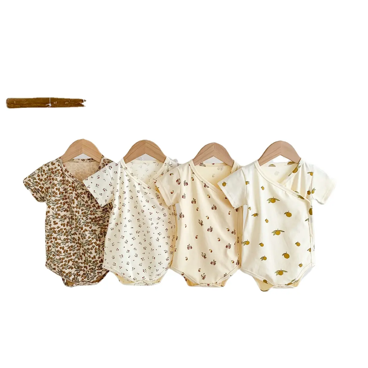 Fuyu Unisex erkek bebek kız Romper giysileri kısa kollu baskı Romper tulum tulum yenidoğan tek parça kıyafet