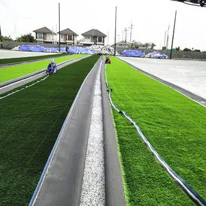 ENOCH ฟุตบอลสนามหญ้าเทียมหญ้าราคาที่ดีป้องกันรังสียูวี PE สำหรับในร่มกลางแจ้งสนามฟุตบอลบริการชีวิต8 ~ 10ปี