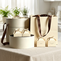 Boîte cadeau cylindrique rigide en carton de luxe avec logo personnalisé pour les fêtes de Noël, les cadeaux d'entreprise et la vente en gros