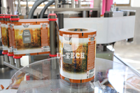 Machine d'étiquetage automatique rotative pour bouteilles d'eau et canettes de boissons, avec colle thermofusible OPP