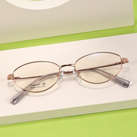 Lunettes unisexes rétro rondes en titane pur, design ultra léger et confortable avec verres PC HD transparents, parfaites pour un usage quotidien