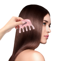 Outil de grattoir à cheveux en résine de qualité supérieure pour le massage du cuir chevelu et la croissance des cheveux.