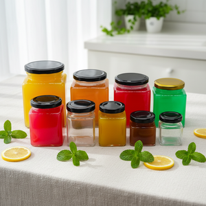 Bouteille en verre carrée pour vente en gros, idéale pour les cornichons au miel et au piment, ou comme pot vide scellé avec couvercle, résistant aux hautes températures, pour la sauce au bœuf à quatre nervures. - Product Image 1