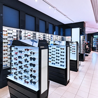 Présentoir à lunettes moderne noir et bleu avec panneau arrière en verre, étagères et base noire, certifié CE ETL pour magasin d'optique