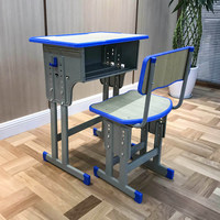 Mobilier scolaire moderne Ensemble de bureau et de chaises Confortable en métal et en bois pour les étudiants d'université Table de classe Chaise