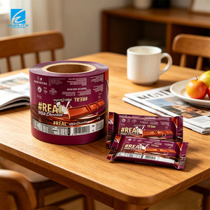 <span class=keywords><strong>Film</strong></span> de scellage <span class=keywords><strong>à</strong></span> froid haute vitesse pour l'emballage de chocolats, bonbons et barres énergétiques – Rouleau de plastique de qualité alimentaire pour l'emballage automatique en flow pack - Product Image 1