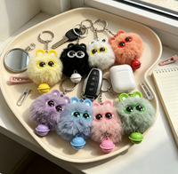 Porte-clés en peluche doux et moelleux, motif monstre de dessin animé aux grands yeux, avec clochette, idéal pour la décoration de sacs à dos - Vente en gros