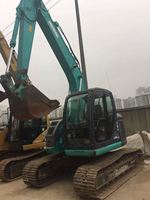 Excavatrice Kobelco SK135 d'occasion de bonne qualité, avec accessoires de brise-roche, de pince et de tarière, certifiée CE