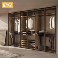 Armoire coulissante en verre de style australien pour chambre à coucher, meuble de rangement avec design superposé