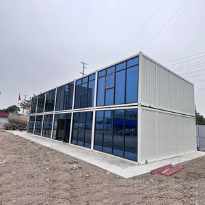 Fabricante de Flat Pack Container House Tiny Prefab Mobile Home con sala de estar para hoteles Uso al aire libre Panel sándwich hecho - Product Image 5