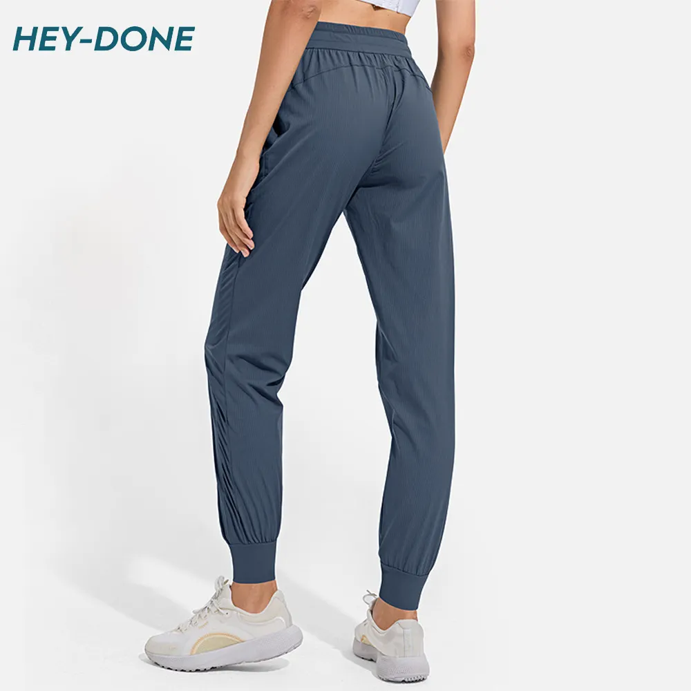 Heydone OEM ODM काटने का निशानवाला कस्टम Sweatpants ढीला फिट प्रशिक्षण घुड़दौड़ Sweatpants फिटनेस रनिंग खेल सीधे पैर Sweatpants