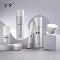 Kit d'ensemble facial de soins de la peau de luxe bleu forme plate emballage de soins de la peau paquet de bouteille cosmétique