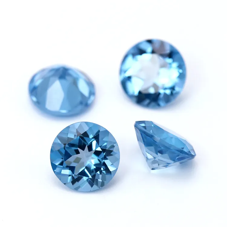 all sizes 4 - 15mm wholesale loose natural gemstone faceted cut round shape swiss blue topaz