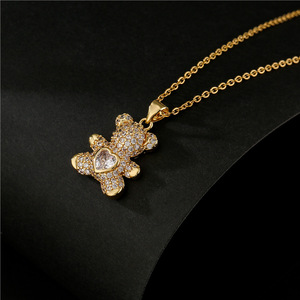 Collier de luxe délicat en acier inoxydable plaqué or 18 carats avec pendentif ours en peluche entièrement orné de zircons CZ étincelants pour femme - Product Image 5