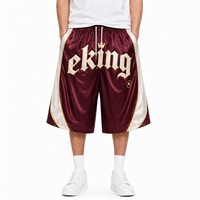 Shorts de basketball capri amples 3/4 style streetwear athlétique avec bordure contrastante et logo graphique imprimé par sublimation personnalisé