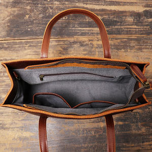 กระเป๋าถือผู้หญิงหนังแท้สไตล์ใหม่ หนังวัวชั้นบนสุด กระเป๋าสะพายไหล่เดี่ยว เรียบง่ายและใช้งานได้หลากหลาย กระเป๋าสะพายข้างผู้หญิง - Product Image 1