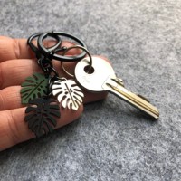 Porte-clés une pièce en métal imprimé personnalisé végétal porte-clés en métal accessoires de charme en nickel botanique personnalisée porte-clés en métal noir feuille